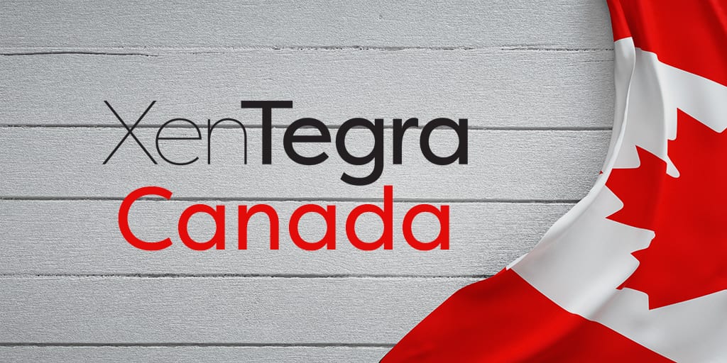XenTegra Canada logo on a light wooden plank background with a Canadian flag draped along the right side.