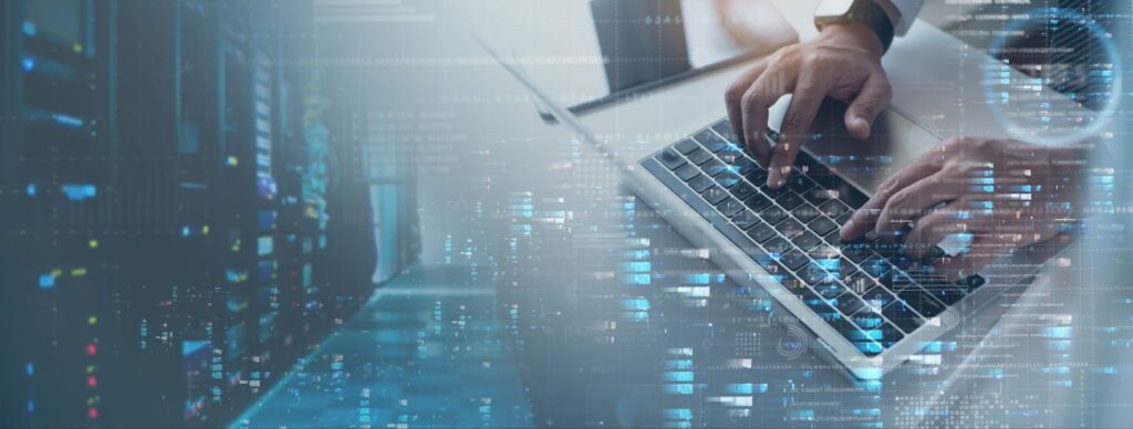 Close-up of hands typing on a laptop with a digital overlay of data streams and server infrastructure, representing IT consulting, data management, and cybersecurity operations.